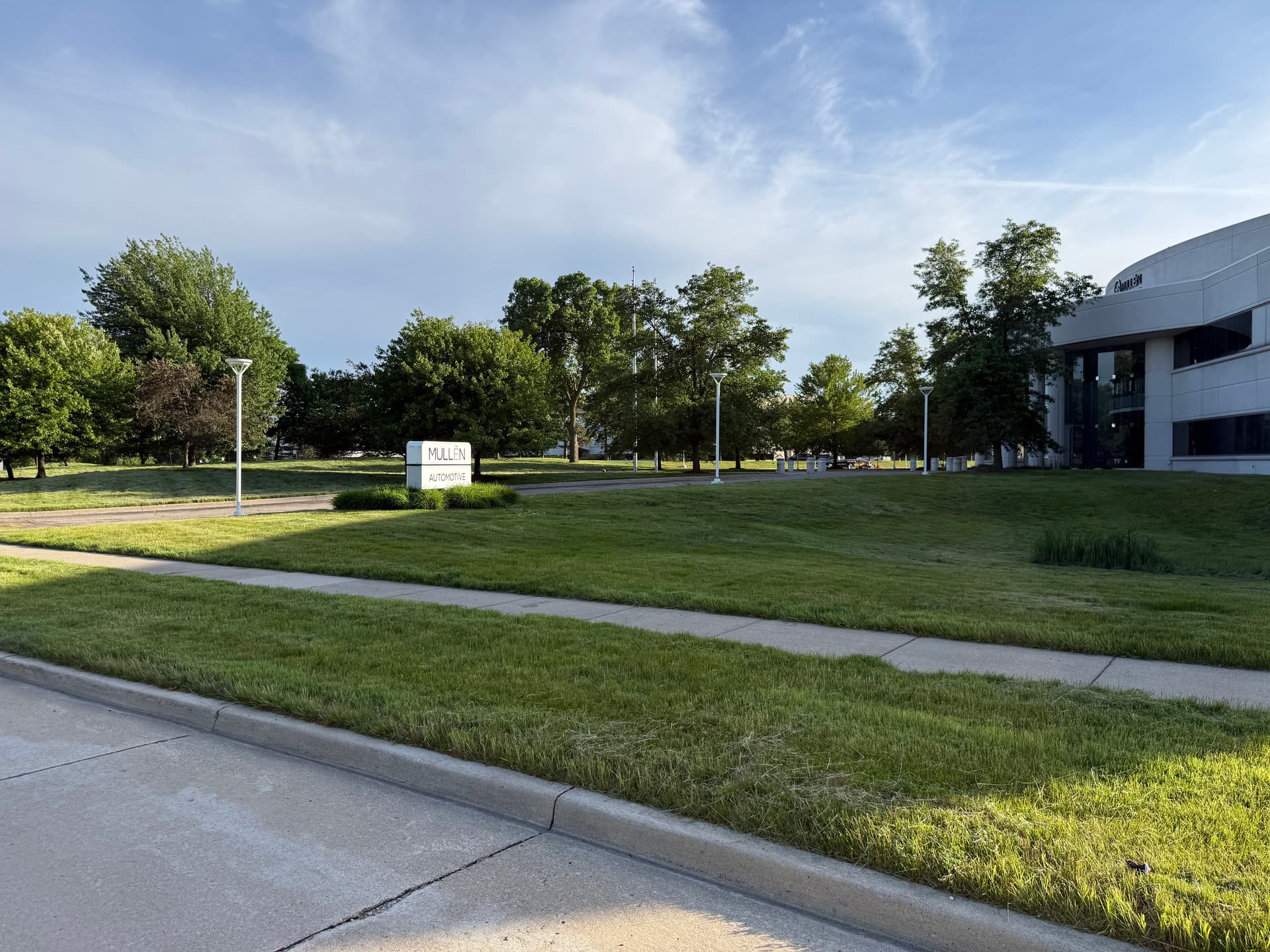 Commercial grounds maintenance at Mullen Automotive corporate campus — Milavec Property Services