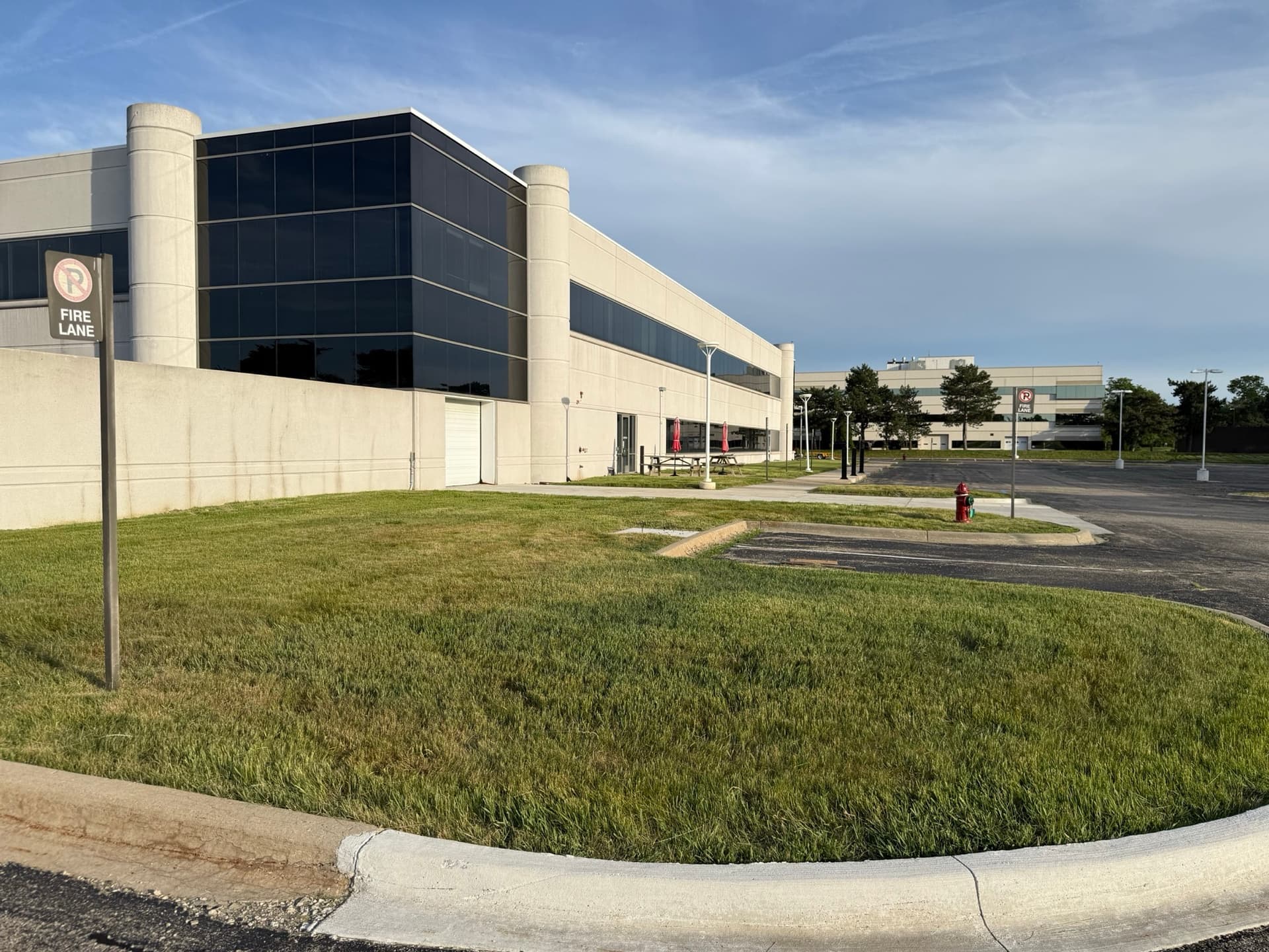 Commercial office building with maintained lawn and curb, Troy, Michigan
